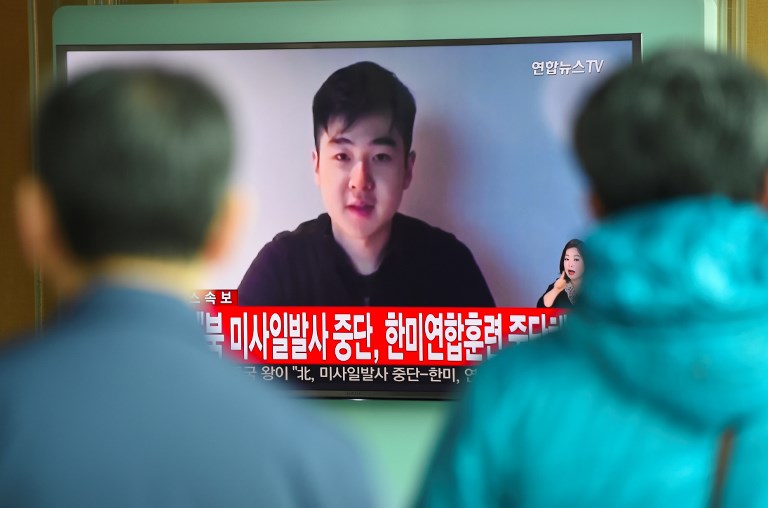 GOVERNMENT-IN-EXILE? South Koreans watch a television news showing a video footage of a man who claims he is Kim Han-Sol, a nephew of North Korea's leader Kim Jong-Un, at a railway station in Seoul on March 8, 2017. File photo by Jung Yeon-Je/AFP 