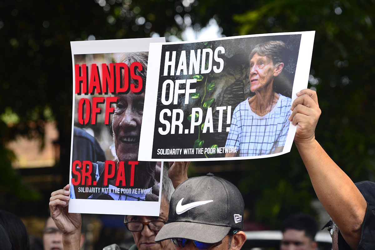 ORDERED TO LEAVE. Protesters in a rally outside the Bureau of Immigration (BI) on April 25, 2018, slam the BI order for Australian nun Sister Patricia Fox to leave the Philippines. Photo by Maria Tan/Rappler 