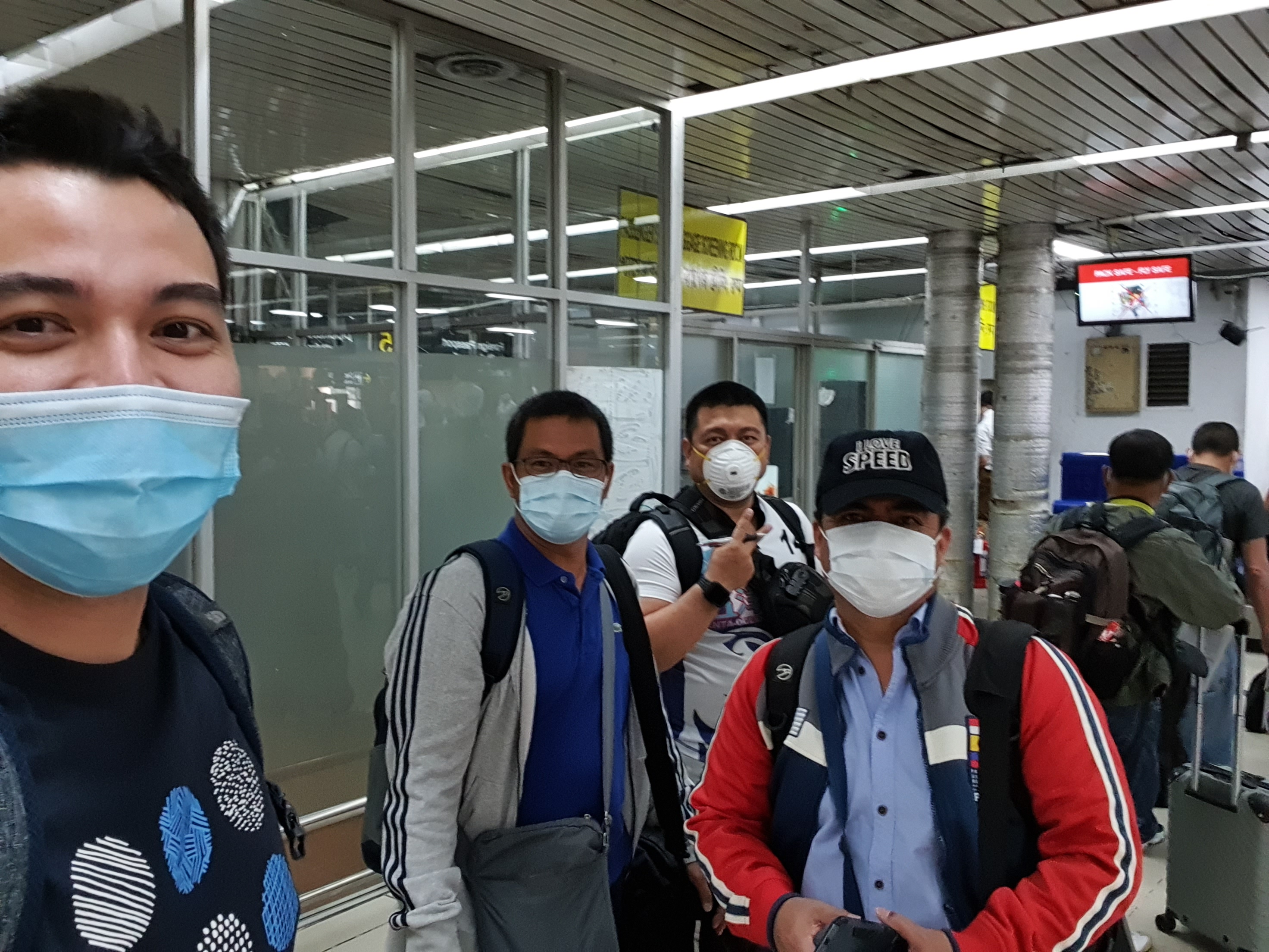 HOMEBOUND. Aeron Orqueta and his workmates make their way back to the Philippines. Photo courtesy of Orqueta    