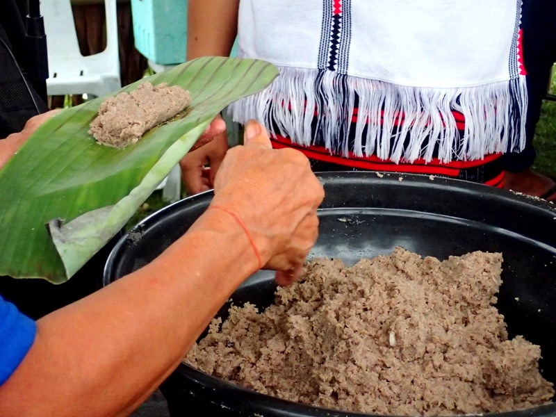 COOKING DEMO. Different groups cooked and shared their cuisine at open-air huts in the park. This one is binakle, an Ifugao sticky rice cake. 