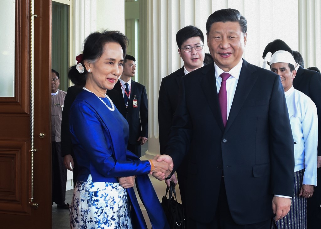 VOWING A 'NEW ERA.' Chinese President Xi Jinping (R) and Myanmar State Counsellor Aung San Suu Kyi shake hands during a welcoming ceremony at the Presidential Palace in Naypyidaw on January 17, 2020.  Photo by Thet Aung/AFP 