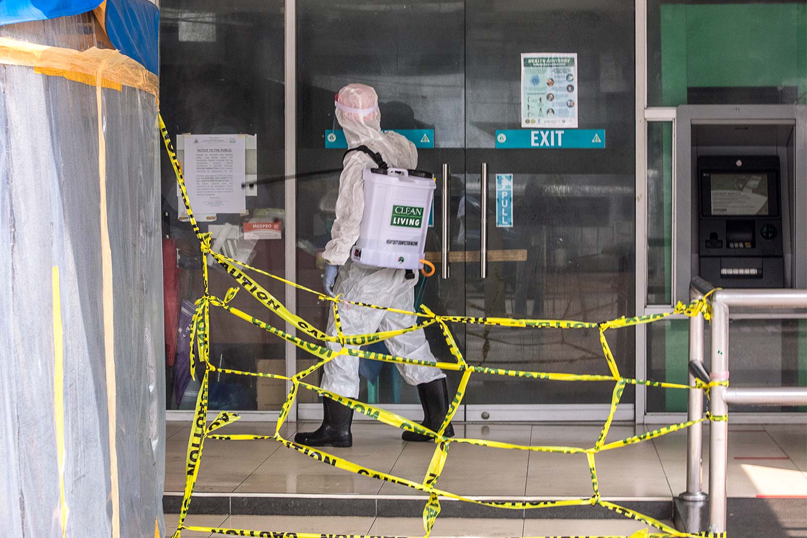 DISINFECTION. Health workers disinfect the the Novaliches District Hospital along Quirino Highway on May 26, 2020. Photo by Darren Langit/Rappler 