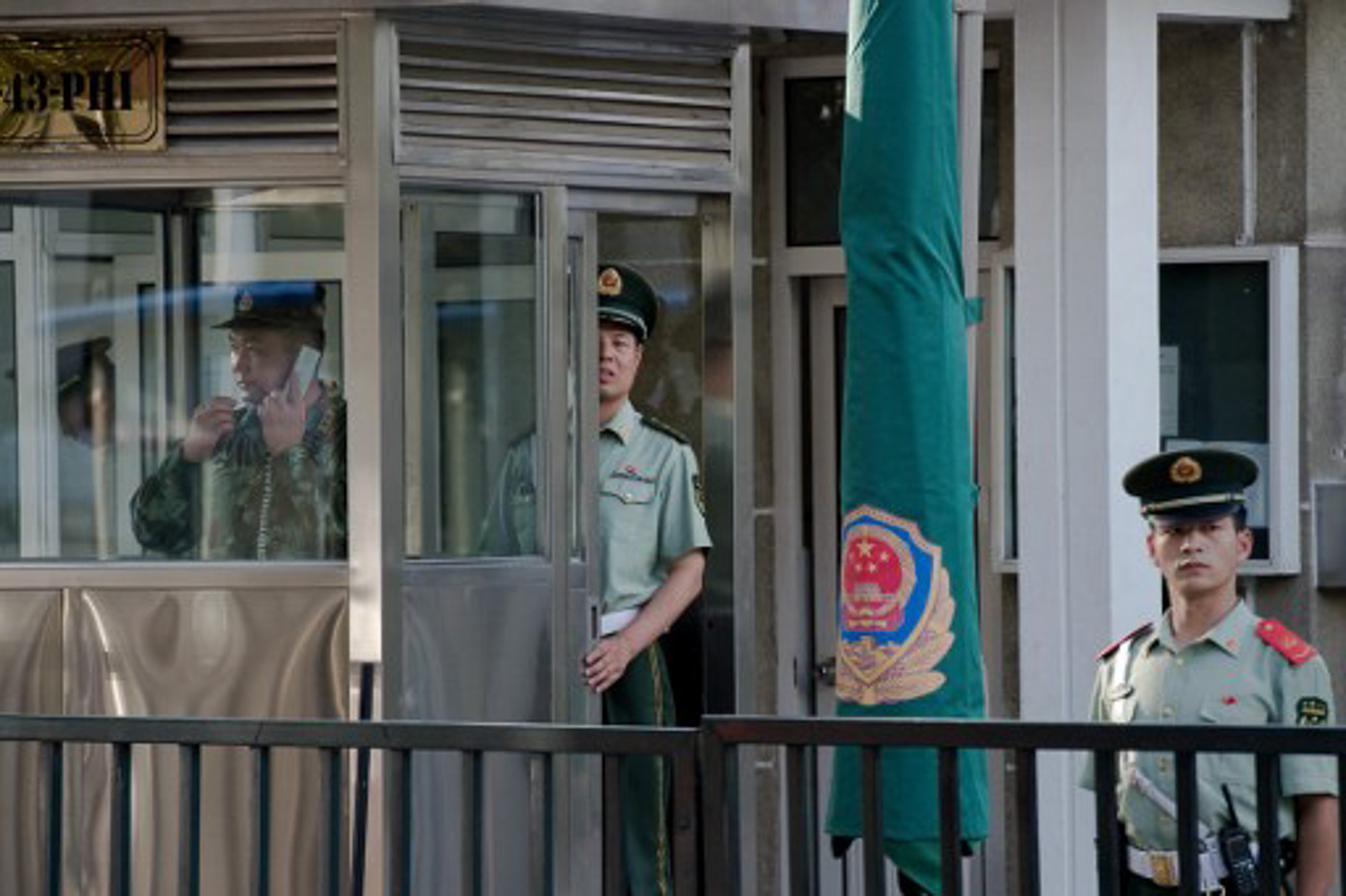 TIGHT SECURITY. Chinese paramilitary police officers secure the front entrance of the Philippines embassy in Beijing on July 12, 2016. Photo by Nicolas Asfouri/AFP 