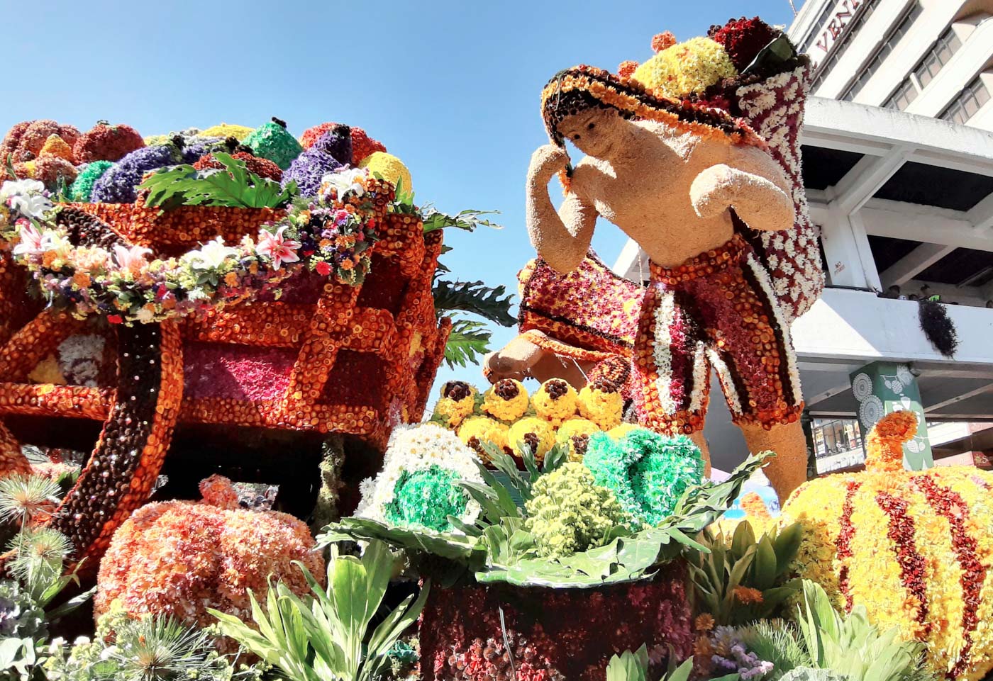 FLOWER PARADE 2019. A colorful float depicts the culture of Baguio as it celebrates the annual Panagbenga festival. All photos by Mau Victa/Rappler  