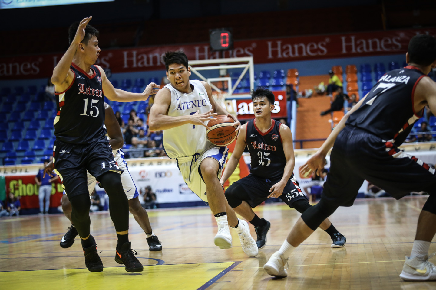 TWINS STAR. Mike Nieto (center) drops 9 points, the same output as his twin brother Matt, to lead Ateneo's balanced charge. Photo by Josh Albelda/Rappler  