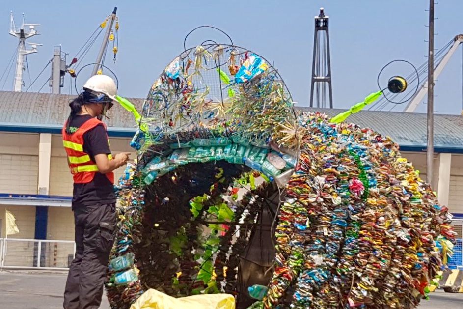 PLASTIC MONSTER. A Greenpeace volunteer ties up used plastic that the eco-warriors had harvested during their "waste audit" for an art installation which will be used for this year's tour. Photo by Anna Mogato/Rappler 