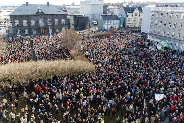 OUT IN THE STREETS. People gather during a protest on Austurvollur Square in front of the Icelandic Parliament in Reykjavic, Iceland, April 4, 2016, calling for the resignation of Prime Minister Sigmundur David Gunnlaugson. Birgir Por Hardarson/EPA 