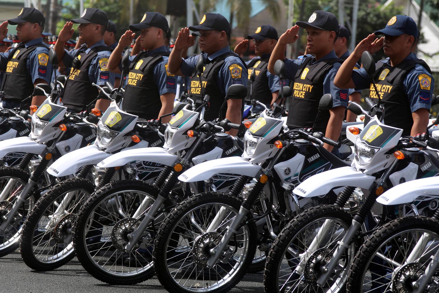 READY FOR SHOOTERS. Quezon City cops accept motorcycles from the city government to fight riding-in-tandem killers. File photo by Darren Langit/Rappler 
