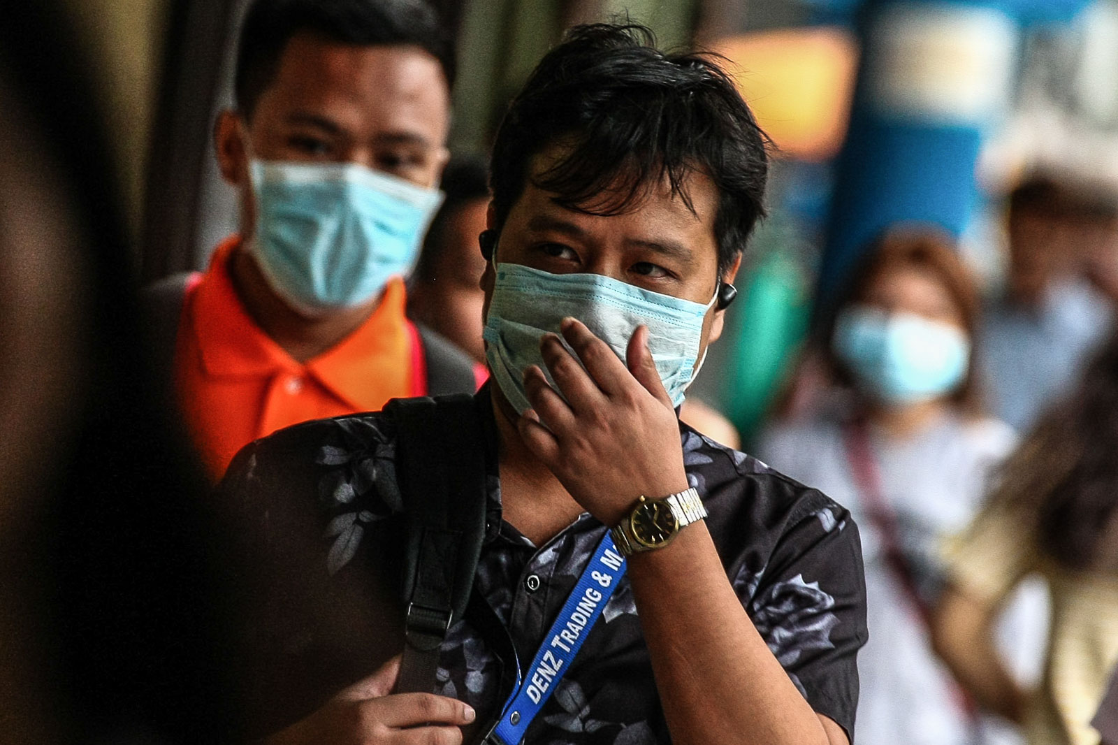 IMPACT ON JOBS. People wear face masks for protection from the Covid-19 virus on March 6, 2020. Photo by Jire Carreon/Rappler