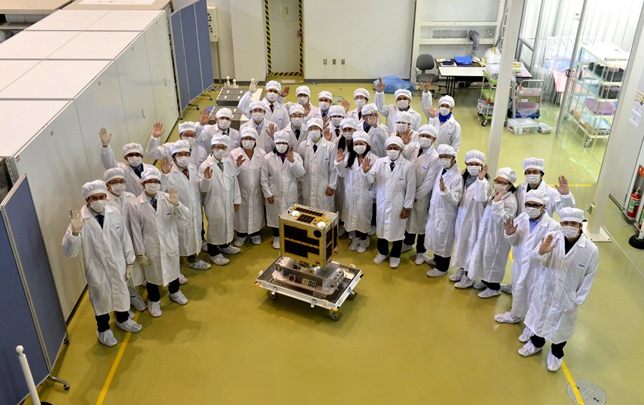 HELLO, DIWATA! Diwata 1, the first Filipino-made microsatellite, is surrounded by Filipino and Japanese scientists in this photo during its turnover to the Japan Aerospace Exploration Agency (JAXA), January 13, 2016. Photo courtesy Department of Science and Technology 