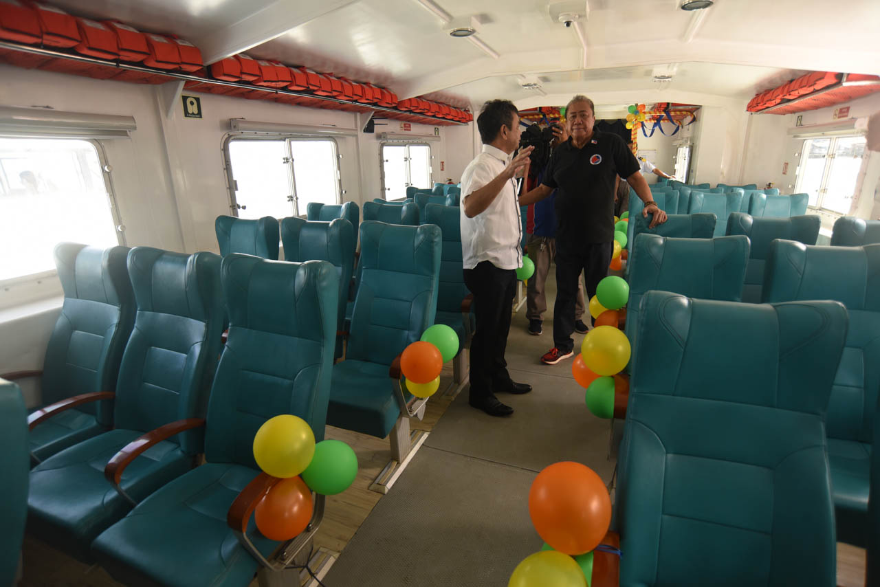 FREE FERRY SERVICE. Transportation Secretary Arthur Tugade gets onboard the MV Island Sabtang, which will be providing free service from Cavite City to Metro Manila until January 31. Photo by Angie de Silva/Rappler 