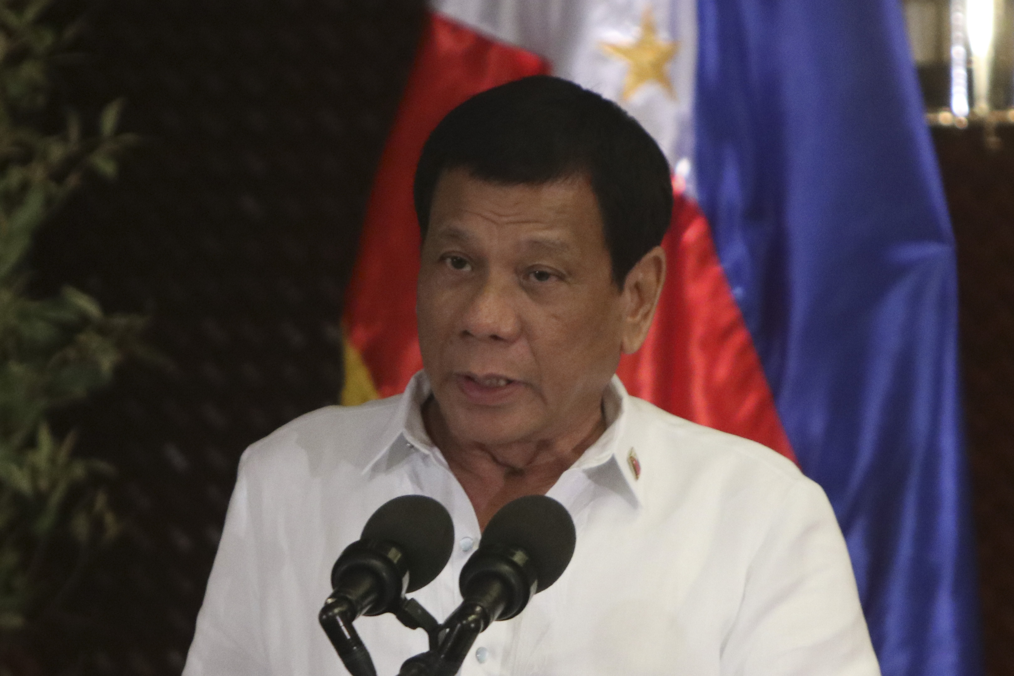 'TERRORISTS.’ Before cancelling the peace talks with communist, President Rodrigo Duterte calls them terrorists. In this file photo, the Commander in Chief speaks at the celebration of the 24th Anniversary of Office of the Presidential Adviser on the Peace Process (OPAPP) at Malacañang Palace. Photo by Lito Boras/Rappler.com  