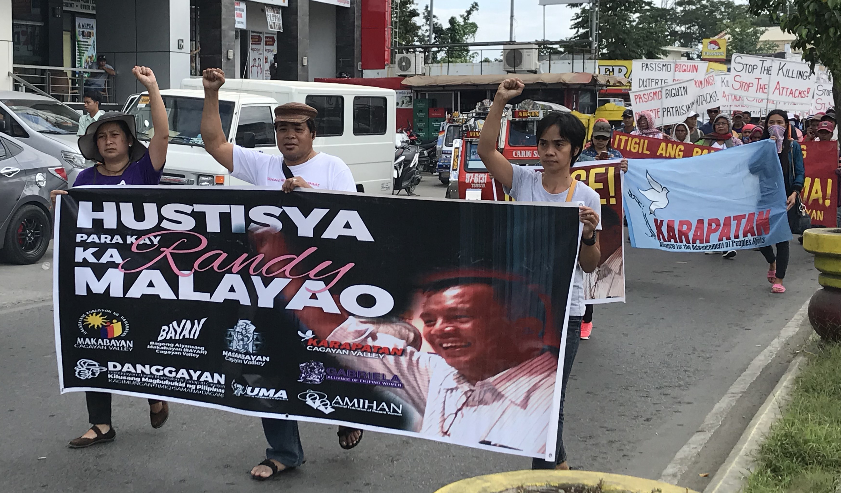 CALL FOR JUSTICE. Supporters of peace consultant and activist Randy Malayao in Tuguegarao City on February 6, 2019, call for an end to 'brazen political killings of leaders and members of progressive' groups. Photo by Raymon Dullana/Rappler 