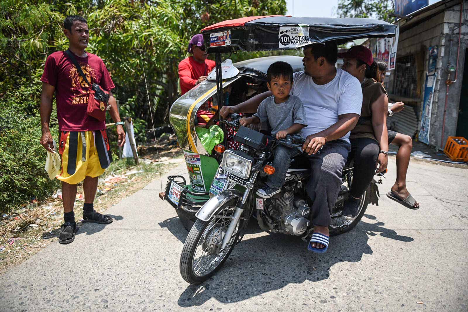 GOING HOME. When all is said and done, the tricycle-driver Marcelino takes his family out for lunch after his crucifixion.   
