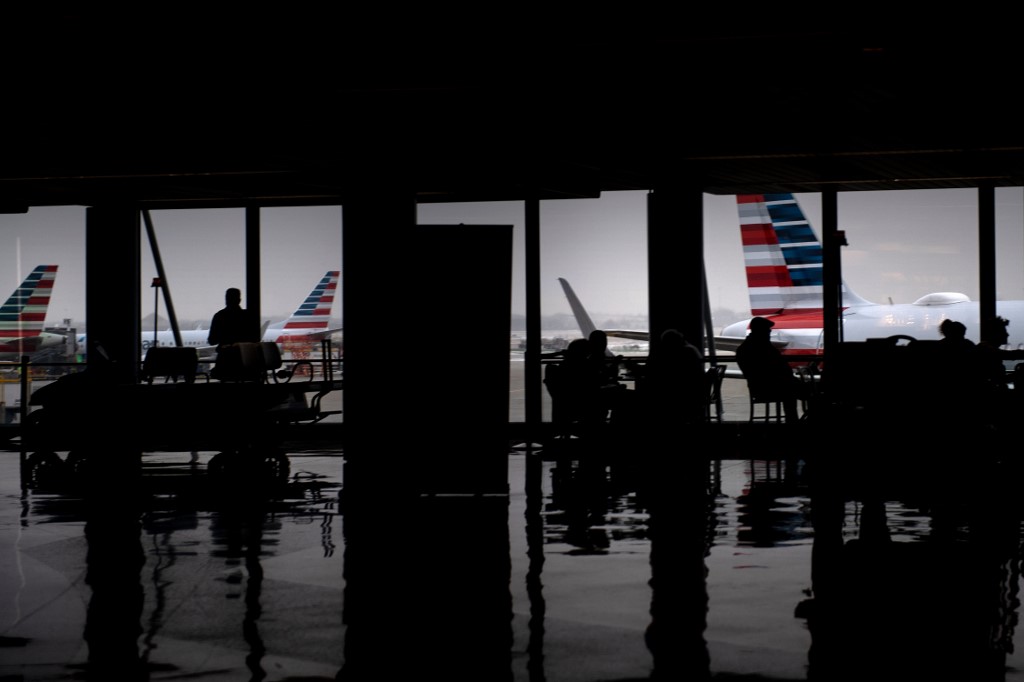 TRAVEL. American Airlines planes are seen as passengers wait at O'Hare International Airport in Chicago on January 27, 2020. File photo by Brendan Smialowski/AFP 