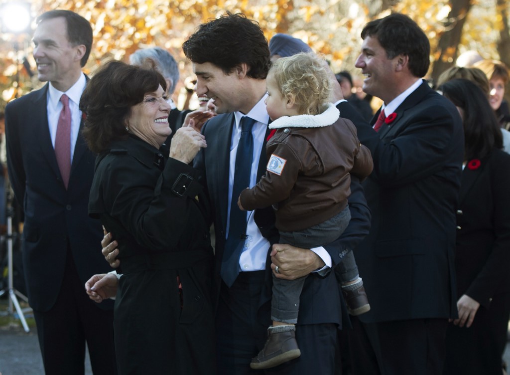 FAMILY. Canadian Prime Minister Justin Trudeau holds his son Hadrien while hugging his mother Margaret outside Rideau Hall in Ottawa on November 4, 2015. Photo by Sean Kilpatrick/AFP 