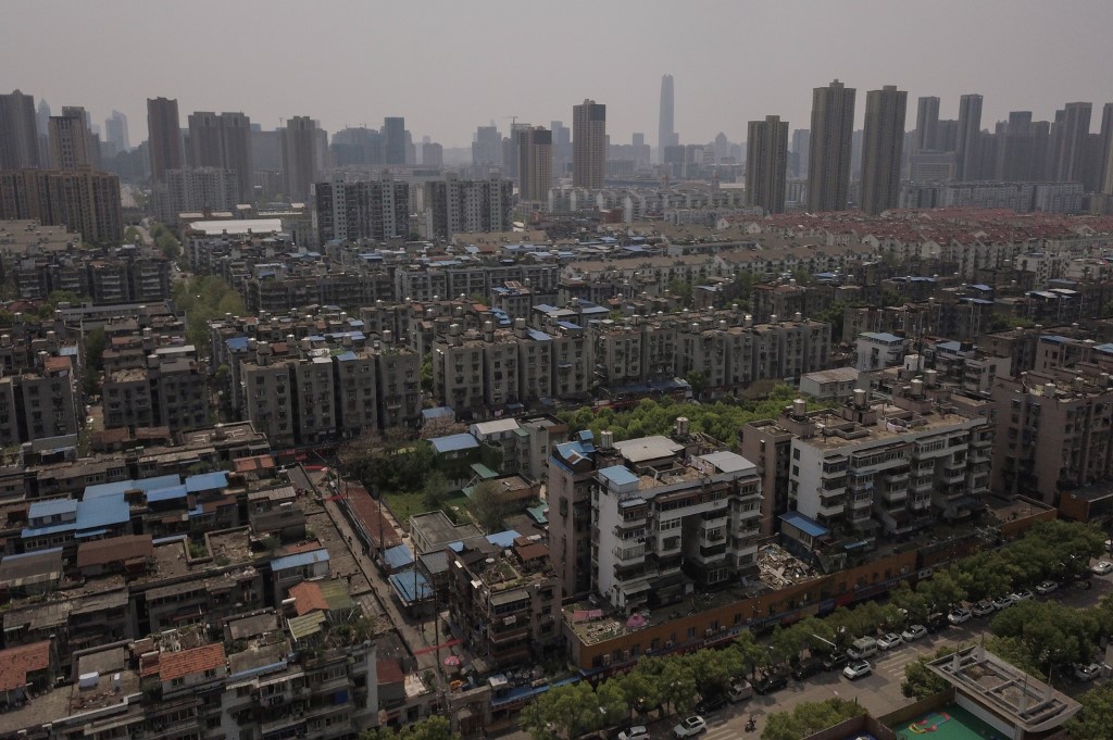 FIRST EPICENTER. A general view shows buildings in Wuhan, in China's central Hubei province, on April 7, 2020. Photo by Hector Retamal/AFP 