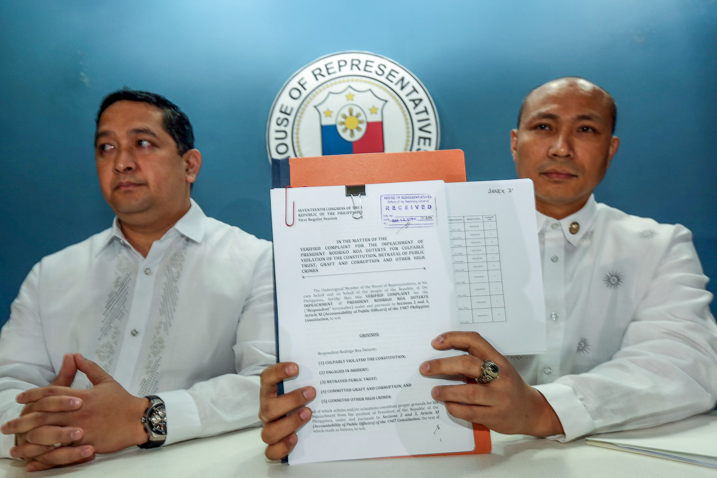 FILED. Magdalo Representative Gary Alejano (right) shows a copy of the impeachment complaint he filed against President Rodrigo Duterte at the House of Representatives. At left is former Magdalo congressman Ashley Acedillo. Photo by Ben Nabong/Rappler 