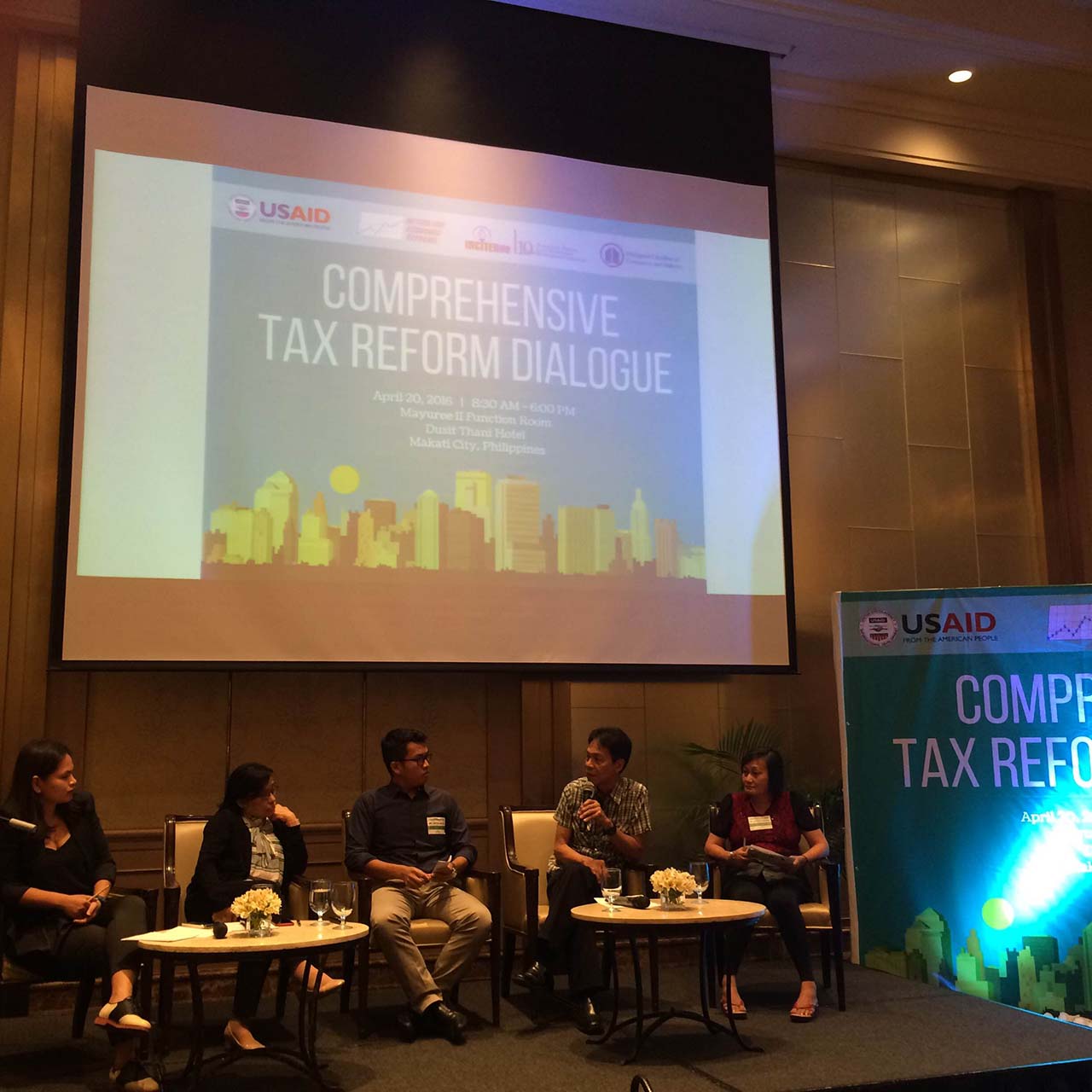 DISCUSSING REFORMS. experts discuss tax reforms at the the comprehensive Tax reform dialogue hosted by TMAP and USAID on April 20. The forum included discussions on possible reforms to excise tax, income and corporate and tax complaince. In the photo are Elsa Agustin of the DOF (2nd from left) and Anton Ragos of AER (3rd from left)  Photo by Chris Schnabel/Rappler 
  