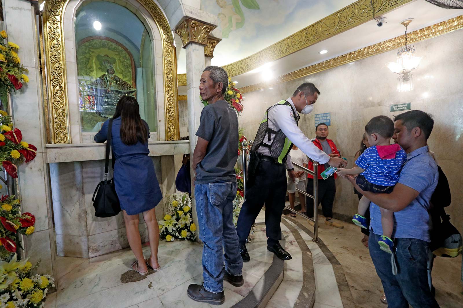 DISINFECTION. The Basilica Minore del Sto Niño management facilitates disinfection on March 12, 2020, as part of precautionary measures for churchgoers against COVID-19. File photo by Gelo Litonjua/Rappler  