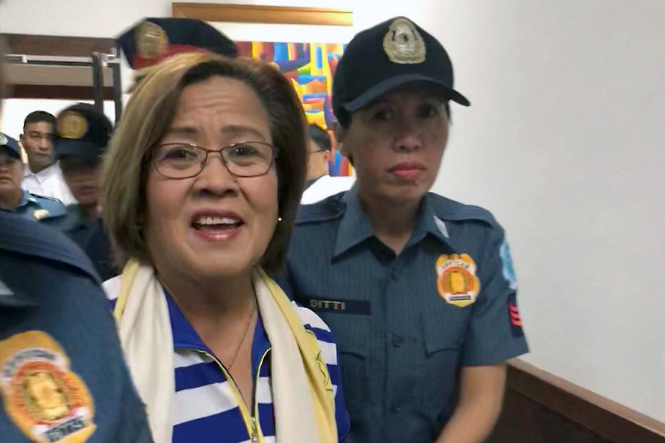 DETAINED. Police escort detained Senator Leila De LIma inside the Philippine Hearth Center for a medical checkup on March 12, 2018. Photo courtesy of the office of Senator De Lima 