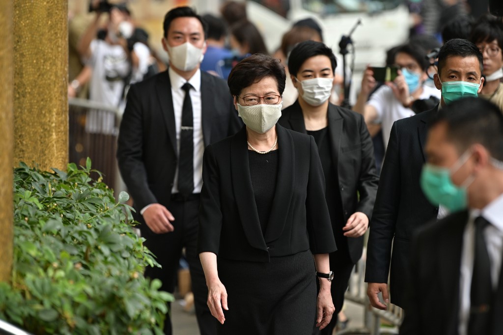 FUNERAL. Hong Kong Chief Executive Carrie Lam (C) arrives for the funeral of late Macau tycoon Stanley Ho in Hong Kong on July 10, 2020. Photo by Anthony Wallace/AFP 