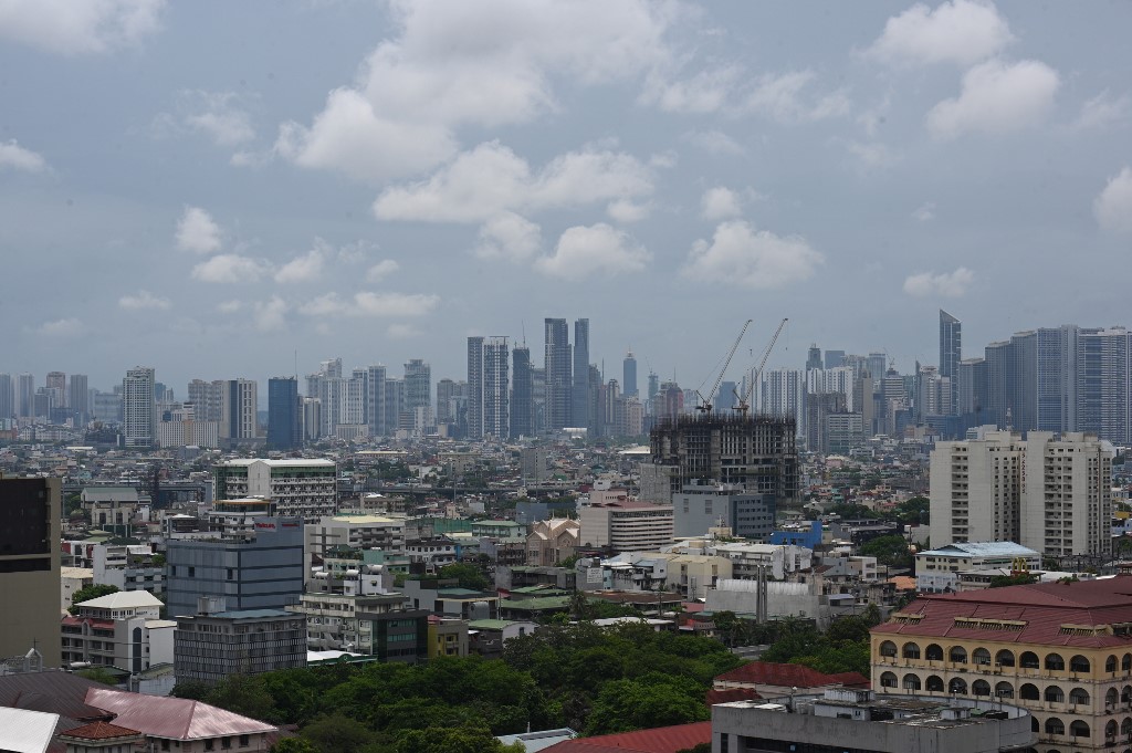 CAPITAL REGION. A general view of the skyline in Metro Manila on May 15, 2020. Photo by Ted Aljibe/AFP 