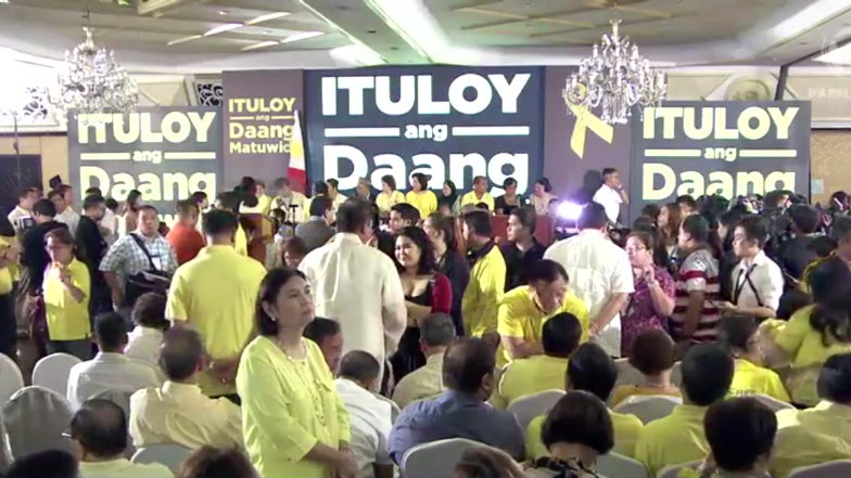 ENDORSEMENT. Supporters and politicians in Club Filipino 