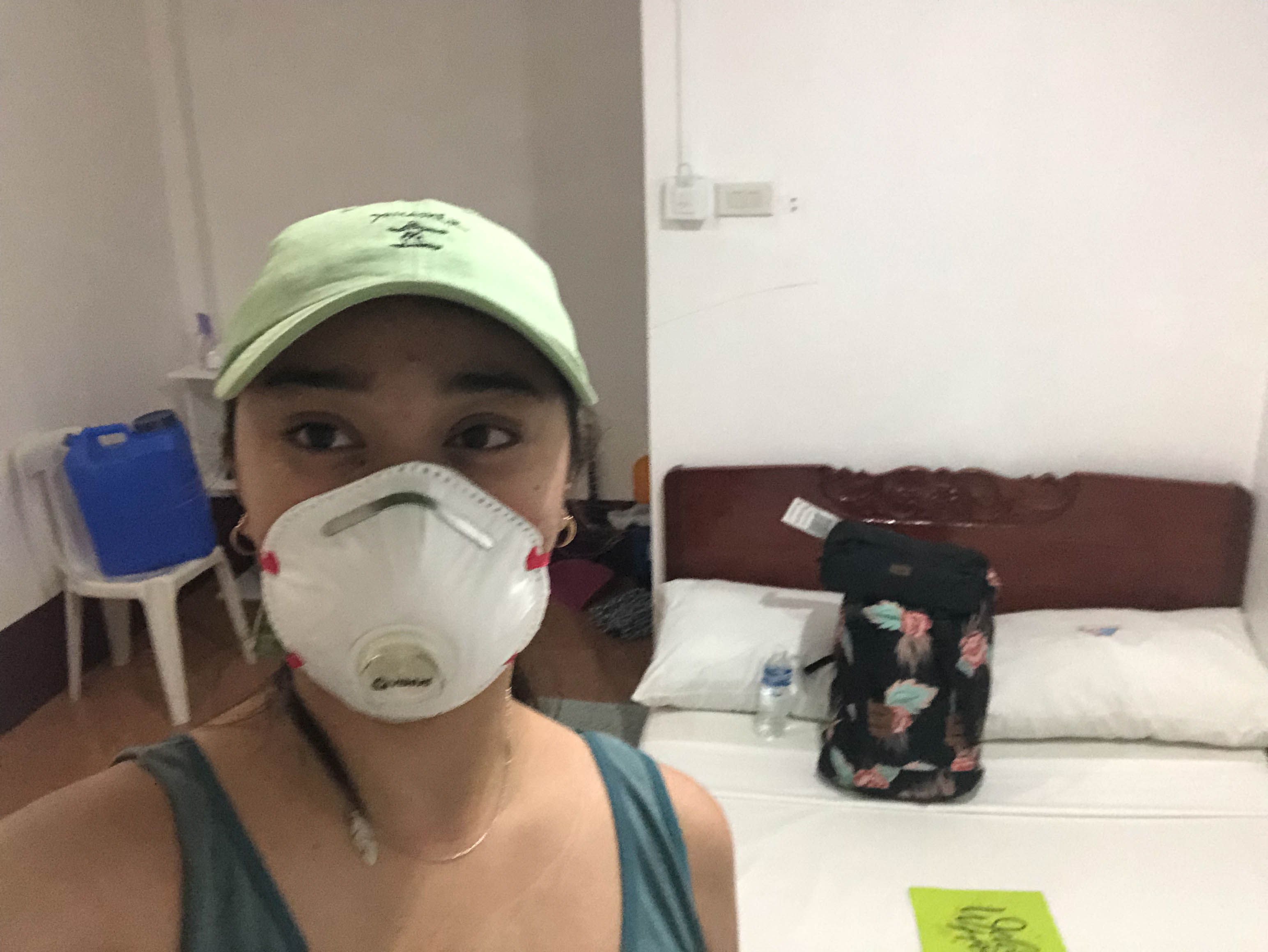 COOPED UP. Krisa Joy Mangilog spends nearly a month in a windowless room in a Quezon City motel. When she arrives in Ibajay, Aklan, she is again placed in quarantine for another 14 days in this room at a beach resort. Photo courtesy of Mangilog  