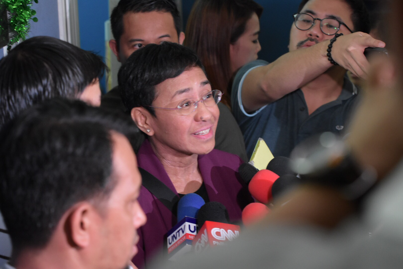 RAPPLER CASES. Rappler CEO Maria Ressa grants an interview with reporters on April 24, 2018, after appearing at the Department of Justice in relation to a separate cyber libel complaint. hoto by LeAnne Jazul/Rappler 