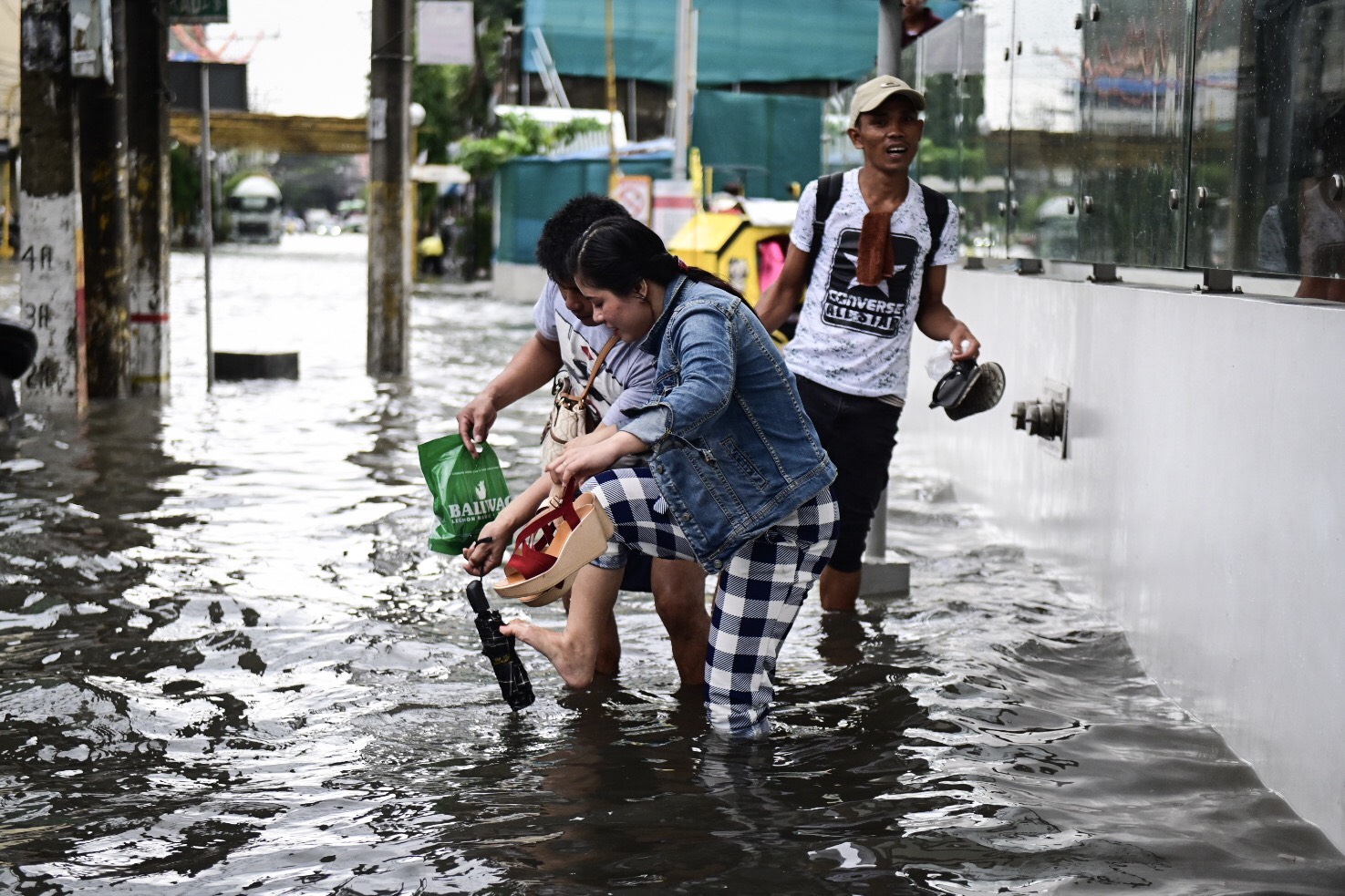 IN PHOTOS: Floods hit Ilocos Norte, Metro Manila due to Ineng, monsoon