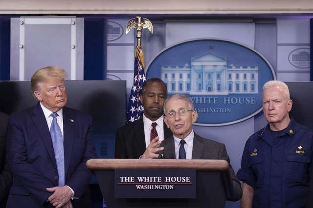 Butt heads. United States President Donald Trump listens to Anthony Fauci, director of the National Institute of Allergy and Infectious Diseases speak at the White House on March 21, 2020. Photo by Tasos Katopodis / Getty Images / AFP 