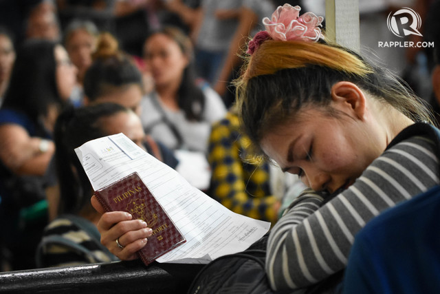 OFW applicants inside POEA on August 29, 2017. File photo by LeAnne Jazul/Rappler 