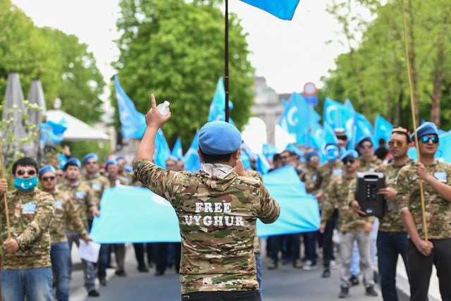 UIGHURS. In this file photo, Ethnic Uighurs take part in a protest march asking for the European Union to call upon China to respect human rights in the Chinese Xinjiang region during a demonstration around the EU institutions in Brussels on April 27, 2018. File photo by Emmanuel Dunand/AFP 