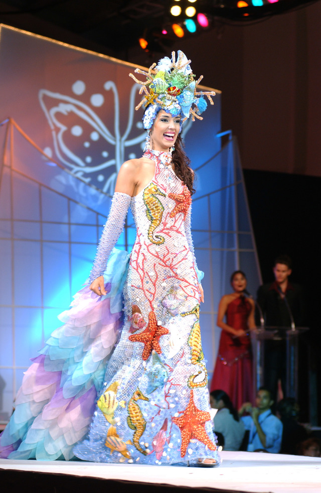 Amelia Vega, Miss Dominican Republic 2003, walks the runway after winning the 2003 Miss Universe National Costume show at the El Panama Hotel in Panama City, Panama. Photo from the Miss Universe Organization 