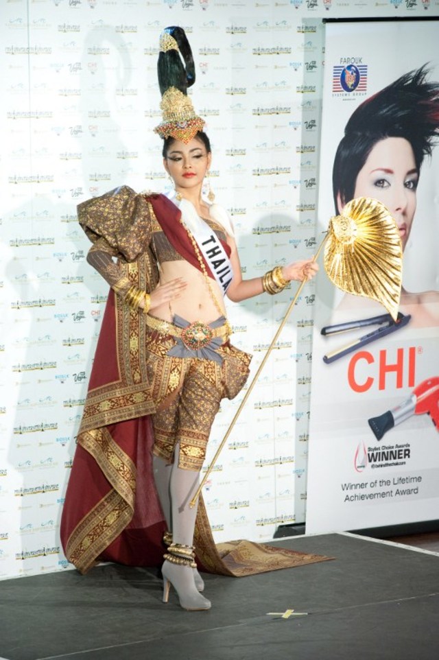 2010 – INSPIRED BY PAINTINGS AND AN ELEPHANT. Fonthip Watcharatrakul, Miss Thailand 2010, poses for photographer in her national costume at the Mandalay Bay Resort and Casino in Las Vegas, Nevada on August 16, 2010. Photo by Patrick Prather/ Miss Universe Organization 