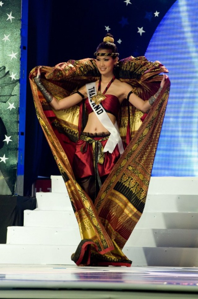 2008 – MUAY THAI INSPIRED. Gavintra Photijak, Miss Thailand 2008, competes in her National Costume at the Lions Theater in Ho Chi Minh City on June 22, 2008. Miss Venezuela Dayana Mendoza, 22, won the Miss Universe pageant. Photo by Darren Decker/AFP Photo/HO/Miss Universe 