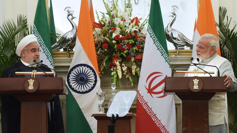 HELPING AFGHANISTAN. This handout photo taken on February 17, 2018 and released by the Indian Press Information Bureau (PIB) shows Indian Prime Minister Narendra Modi (R) and Iranian President Hassan Rouhani during a joint press briefing at Hyderabad House in New Delhi.
The Iranian President is on a three-day official visit to India. AFP PHOTO/PIB  