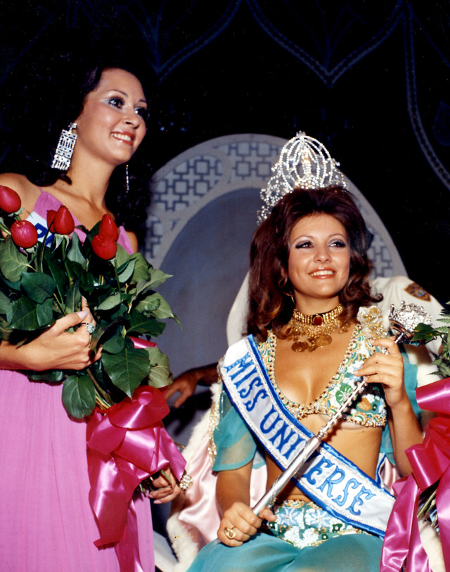 FIRST LEBANESE MISS UNIVERSE. Georgia Risk, MISS UNIVERSE 1971 from Lebanon poses with her runner up Miss Puerto Rico. Photo from the Miss Universe Organization. 