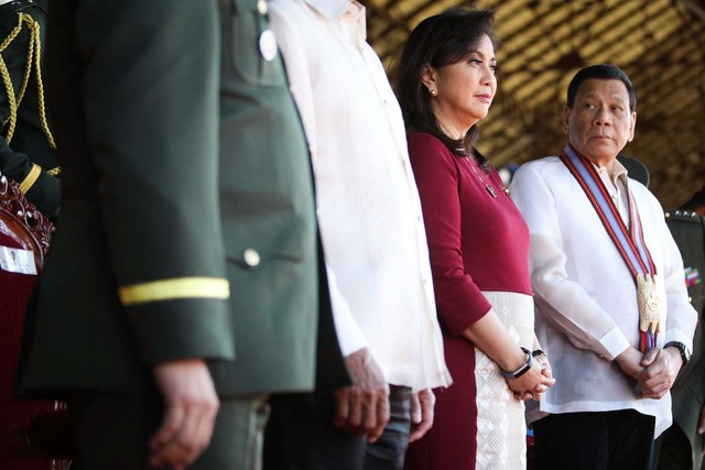 WORKING TOGETHER. Vice President Leni Robredo is greeted by President Rodrigo Duterte at the graduation rites of PMA Alab-Tala Class of 2018, at Fort del Pilar, Baguio City on Sunday, March 18, 2017. Photo by OVP