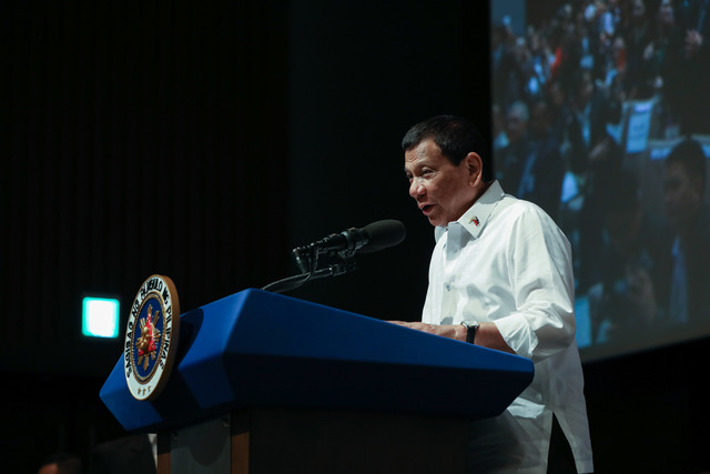 ATTENTION TO OFWS. President Rodrigo Duterte speaks to OFWs in Japan. Malacañang file photo 