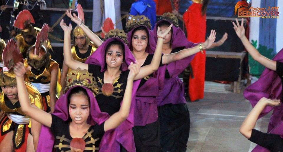 DEDICATION. Students of Landy National High School perform 'Agony in the Garden' in a festive beat. Photo courtesy of Santa Cruz Municipal Tourism Office   