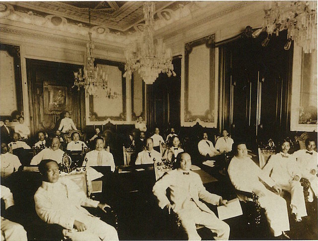 100TH ANNIVERSARY. The Senate of the Philippines with Manuel L. Quezon (back of the room) presiding, in the Marble Hall of the Ayuntamiento de Manila. Photo from the Official Gazette of the Philippines 