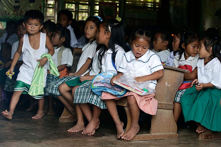 children are attending school remotely in