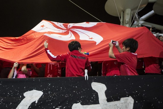 Defiant Hong Kong football fans boo Chinese anthem