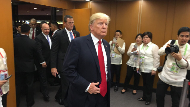 TALKING TRADE. US President Donald Trump strides into the room where he holds a bilateral meeting with President Duterte. MPC pool photo 