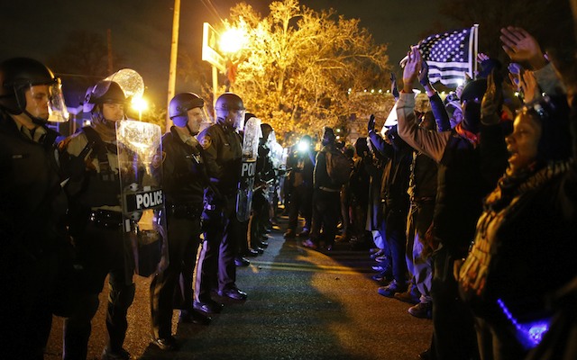 Troops tripled in Ferguson; protests spread