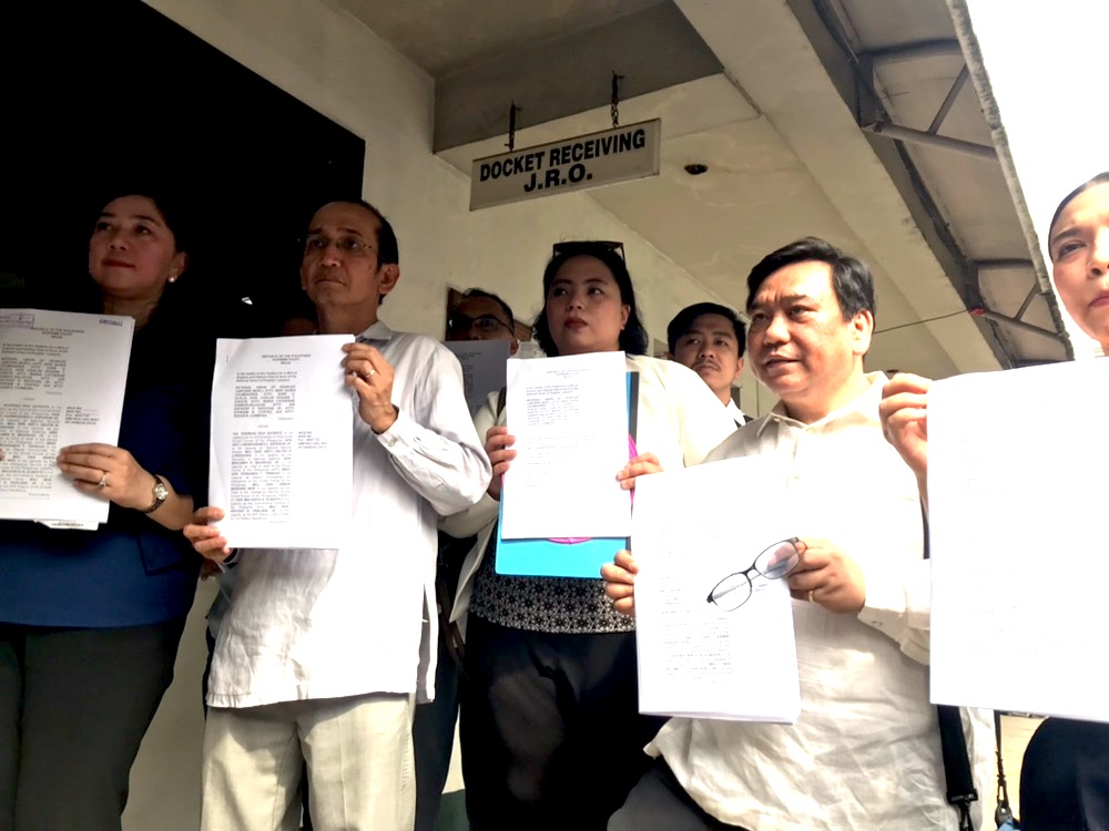 PROTECTIVE WRITS. The National Union of Peoples' Lawyers (NUPL) run to the Supreme Court to ask for a Writ of Amparo and a Writ of Habeas Data citing threats from the military. Photo by Lian Buan/Rappler 