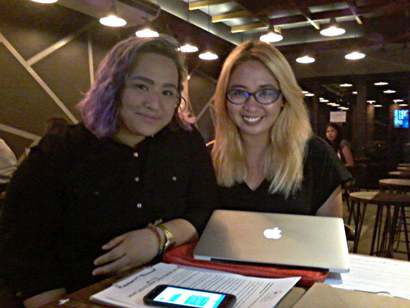 ORGANIZERS. Nicky Castillo and Loreen Ordono prepare for the 2017 Pride March scheduled on June 24. Photo by 
Timothy Palugod   