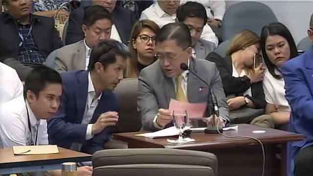 SPORTS BUDGET. Senator Bong Go, sponsor of the Philippine Sports Commission budget, is being coached by BCDA president Vince Dizon on questions about the New Clark City Sports Complex. Senate YouTube screenshot 